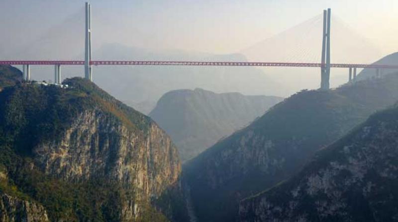 The 1,341-metre span cost over 1 billion yuan ($144 million) to build, according to local newspaper Guizhou Daily. (Photo: AFP)