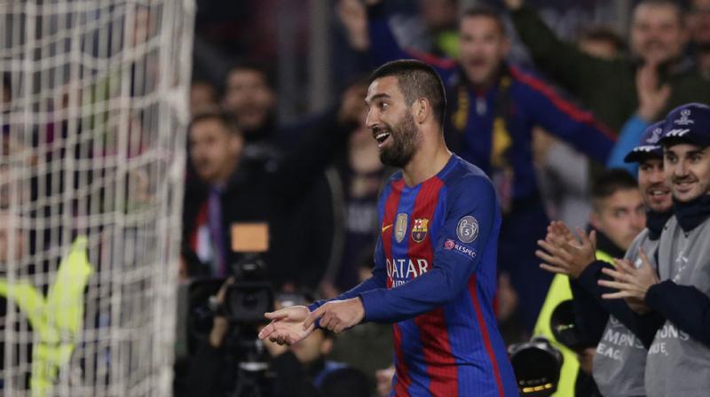 Turkey midfielder Arda Turan hit a quickfire second-half hat-trick to propel Barcelona to a 4-0 win at home to Borussia Moenchengladbach in Group C with Lionel Messi also on target for the Catalan giants. (Photo: AP)