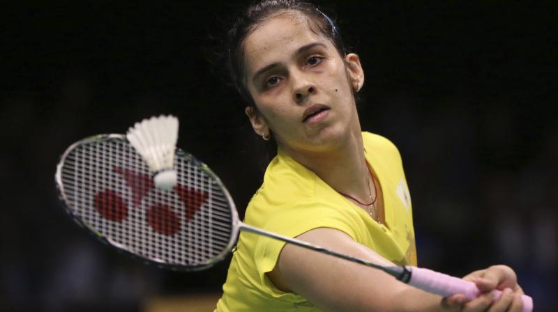 Saina, seeded seventh, took 39 minutes to tame Hong Kongs Pui Yin Yip 21-14 21-16 in her second round womens singles encounter. (Photo: AP)