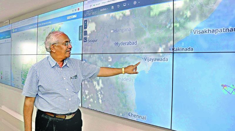 IMD New Delhi director general of metrology K.J. Ramesh explains the details of weather alerts in Vijayawada on Friday. (Photo: DC)