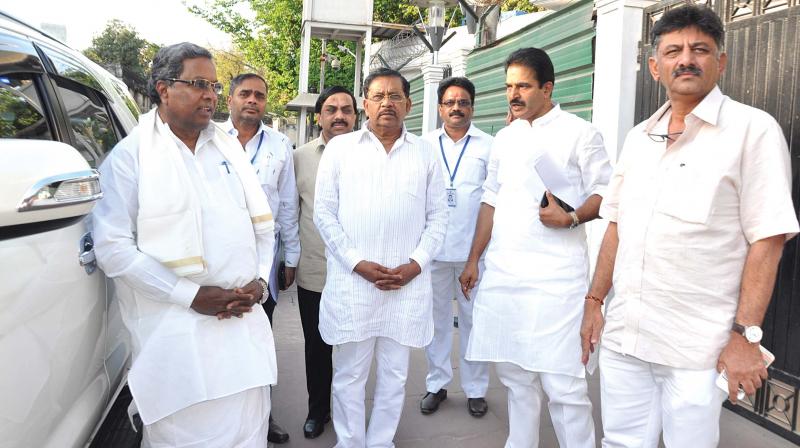 Chief Minister Siddaramaiah and other Congress leaders at the residence of the Congress chief Rahul Gandhi, in New Delhi on Tuesday. (Photo: DC)