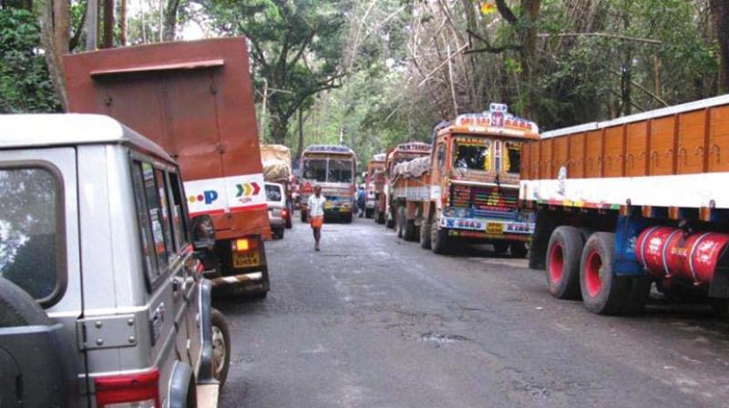 A file picture of vehicles lined up at a checkpost at Wayanad in Kerala waiting for the night travel ban to be over.