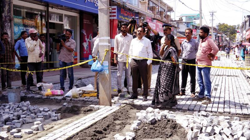 District Collector U.V. Jose along with the officials of district administration inspect the works at SM Street on Tuesday. (Photo: DC)