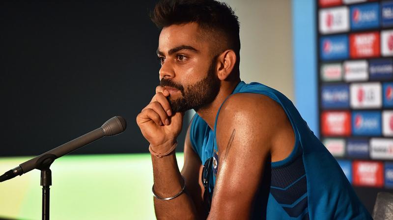 Virat Kohli said he feels lucky to still have Dhoni in the dressing room. (Photo: AFP)
