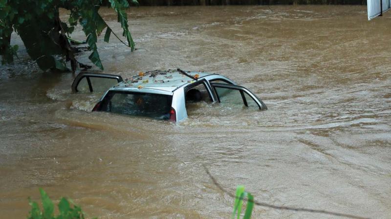 A car seen fully submerged at Edappally in Kochi during the flood time	(Photo: DC)