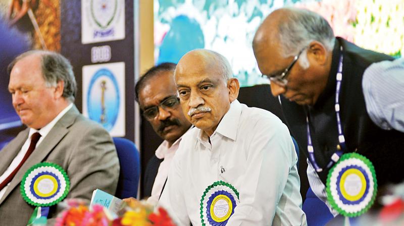 ISRO Chairman Dr A.S. Kiran Kumar (centre) and others at the 6th International Conference on Climate Change and Sustainable Water Resource Management-Innovative Geospatial Solutions in Bengaluru on Thursday. (Photo: DC)