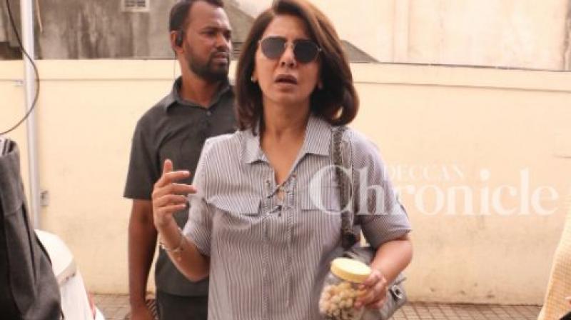 Neetu Kapoor spotted at the same time as Salman Khans Race 3 trailer launch.