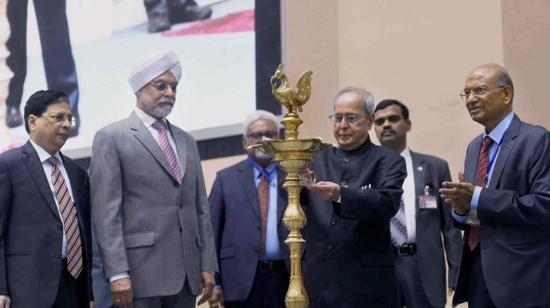President Pranab Mukherjee with Chief Justice of India JS Khehar during the inauguration of All India Seminar in New Delhi. (Photo: PTI)