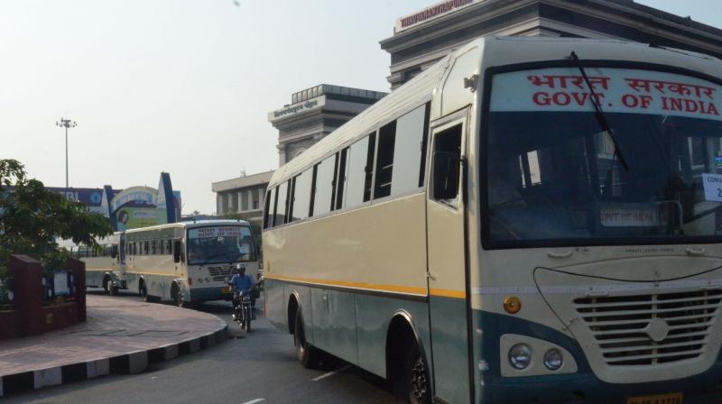 A convoy of VSSC buses go past the Thiruvananthapuram Central Railway station on the general strike day on  Monday. (Photo: Peethambaran Payyeri)