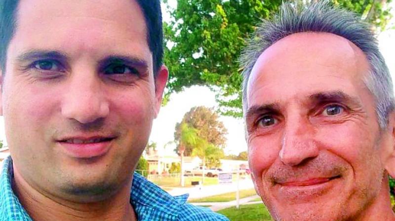 Jon ONeill, right, poses with World War II historian Justin Taylan for a selfie in De Land, Fla. The photo was shared by Justin Taylan a year ago. (Photo: Agencies)