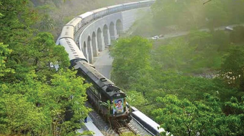 View of Kollam-Thambaram train above the 13- arch bridge along the newly opened Punalur-Sengottai broad gauge rail route.
