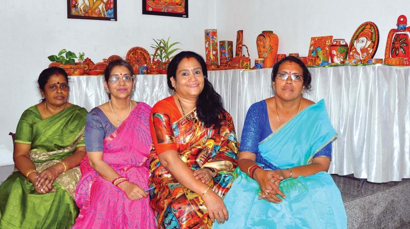 (From left) Latha Rajan, Veena Saboo, Praneetha Divakaran and Premja Baburaj with their products. 	 DC