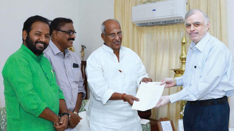 Governor P. Sathasivam receives the memorandum from O. Rajagopal, MLA.