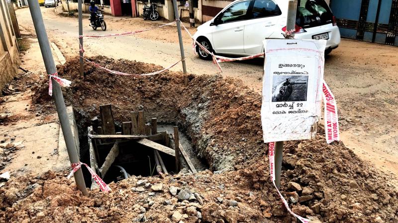 The road has become virtual death traps for pedestrians and two-wheelers with potholes all over. It needs a significant amount of perseverance for the motorists to evade potholes. 	(Photo: DC)