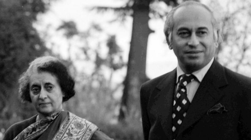 Pakistani leader Zulfikar Ali Bhutto stands with Indian Prime Minister Indira Gandhi before a summit in Simla, India, on June 28, 1972. Bhutto was overthrown in a military coup in 1977 and hanged two years later (Photo: Associated Press)