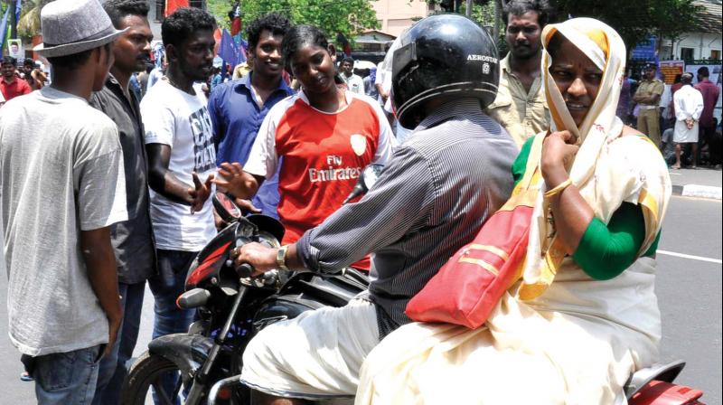 Hartal supporters block bike riders in front of the secretariat on Monday. (Photo: Peethambaran Payyeri)