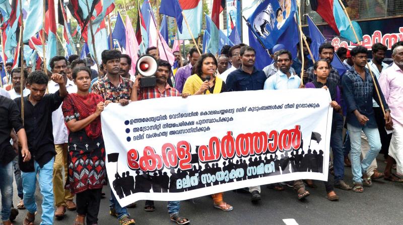 Dalit activists take out a march from Thampanoor in Thiruvanthapuram on Monday.