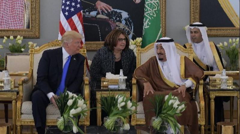 US President Donald Trump and Saudi Arabias King Salman bin Abdulaziz  al-Saud stop for coffee following Trumps arrival in Riyadh (Photo: AFP)