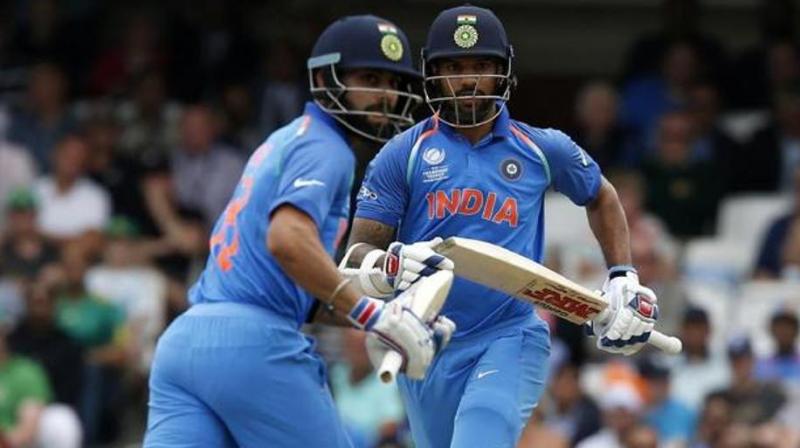Shikhar Dhawan (78) and Virat Kohli (76 not out) shared a fluent partnership of 128 to lead India to victory with 12 overs to spare. (Photo: AFP)