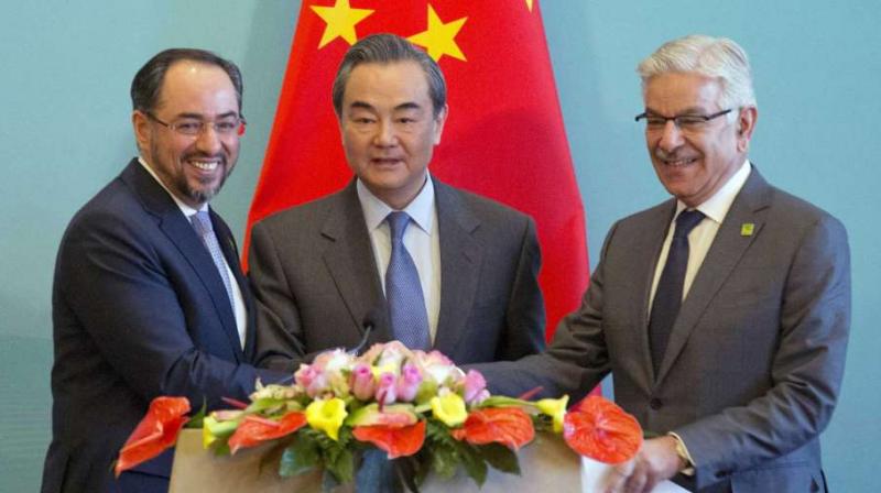 (From left) Afghanistan foreign minister Salahuddin Rabbani, Chinese foreign minister Wang Yi and Pakistani foreign minister Khawaja Asif at press conference for the 1st China-Afghanistan-Pakistan Foreign Ministers Dialogue in Beijing on December 26, 2017. (Photo: AP)