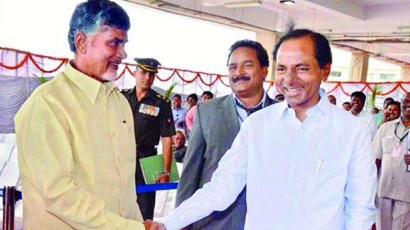 Andhra Pradesh Chief Minister N. Chandrababu Naidu and Telangana Chief Minister K. Chandrasekhar Rao.