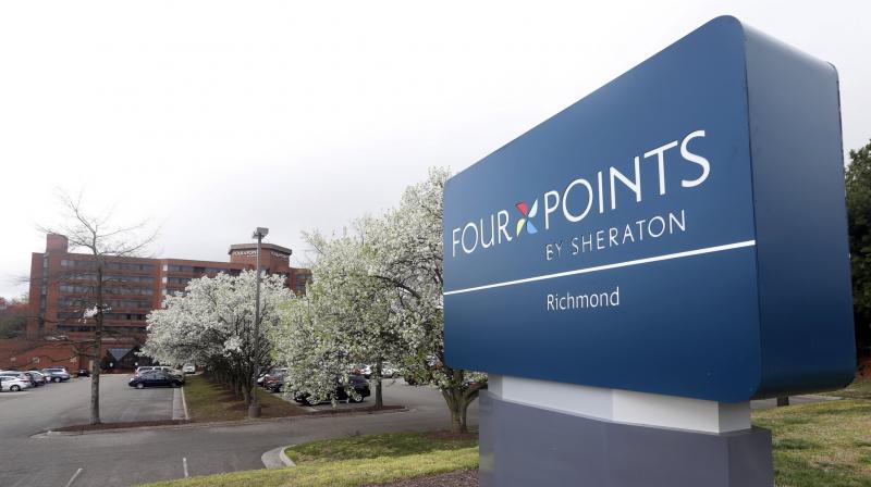 This March 25, 2016, file photo shows the sign at the Four Points Sheraton Hotel in Richmond, Va. The information of as many as 500 million guests at Starwood hotels has been compromised and Marriott said that its discovered that unauthorized access to data within its Starwood network has been taking place since 2014. The company said Friday, Nov. 30, 2018, that credit card numbers and expiration dates of some guests may have been taken. (AP Photo/Steve Helber, File)