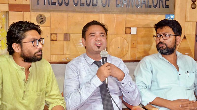 From left: Gujarat MLA Jignesh Mevani, Dr Kafeel Khan from Gorakhpur and human rights activist Nadeem Khan  during a press conference in Bengaluru on Thursday  (Image: DC)