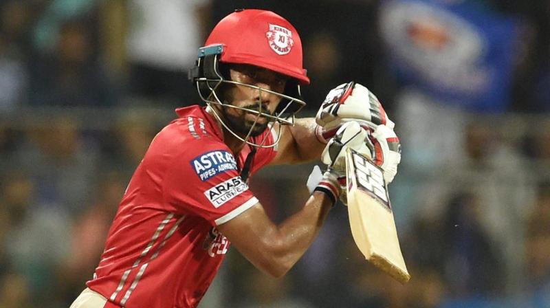 Kings XI Punjab batsman Wriddhiman Saha plays a shot during the IPl T20 match against Mumbai Indians at Wankhede in Mumbai on Thursday. (Photo: AP)