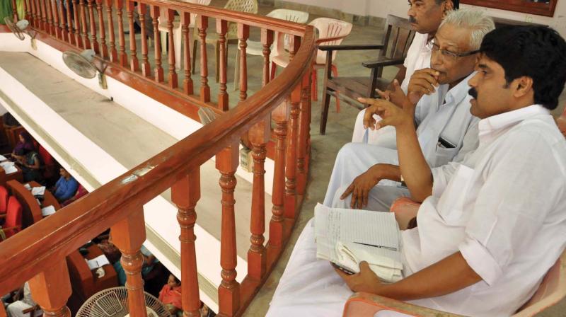 Kozhikode DCC president T. Siddique watches the council proceedings from the gallery of Kozhikode Municipal Corporation council hall on Thursday. (Photo: VENUGOPAL)