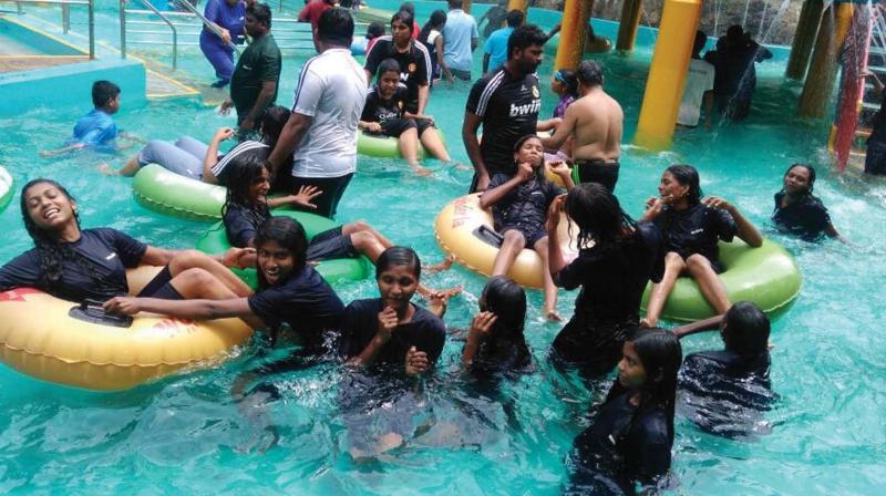 Students of Aralam Government High School, Kannur enjoy their day out in in Kochi lake on Thursday.