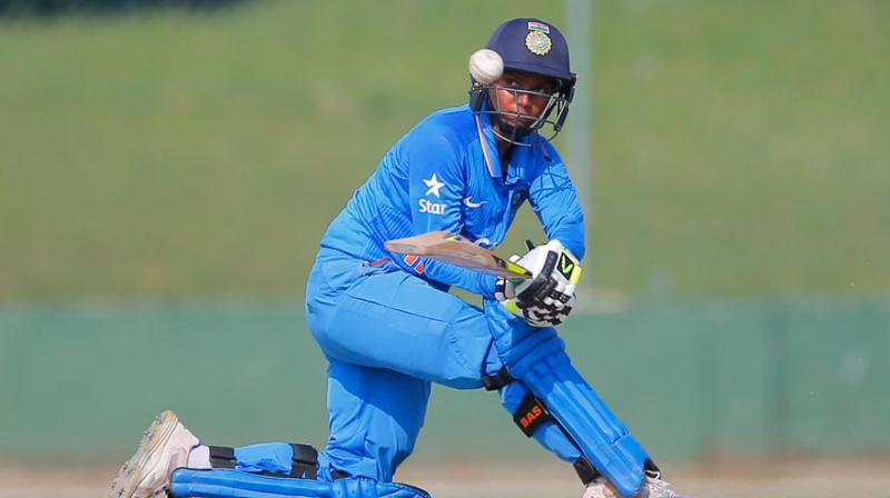 Deepti Sharma (188) and Poonam Raut (109) played out for 45.3 overs during their epic stand after India elected to bat in Mondays game, which they won by 249 runs. (Photo: AP)