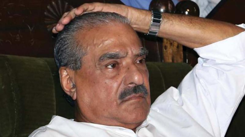 K.M. Mani