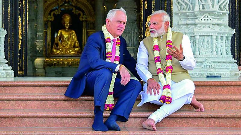 Prime Minister Narendra Modi and his Australian counterpart Malcolm Turnbull at the iconic Swaminarayan Akshardham Temple in New Delhi on Monday.