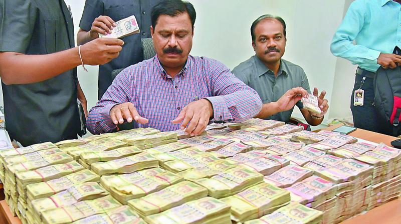 The seized scrapped notes being displayed at the task force DCPs office in Secunderabad on Sunday. (Photo:  DC)