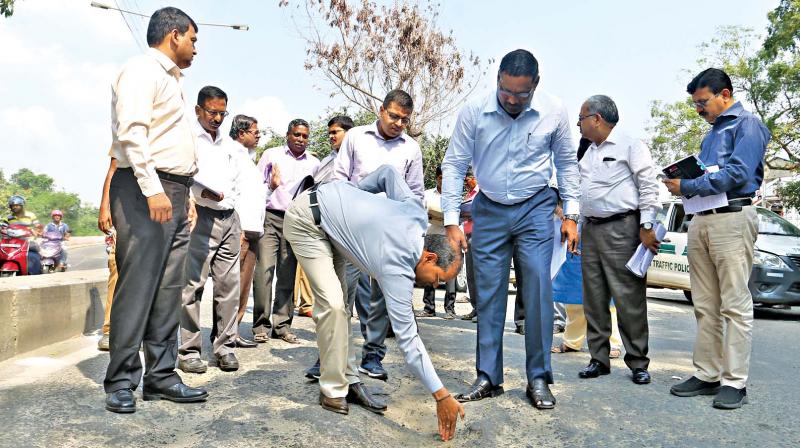 High-level inter-state Central team inspects the damaged roads near Basin Bridge powerhouse along with Greater Chennai Corporation commissioner  D. Karthikeyan and revenue secretary B. Chandramohan, on Thursday. (Photo: DC)