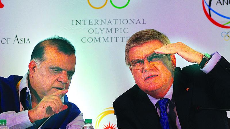 Indian Olympic Association president Narinder Batra (left) and International Olympic Committee president Thomas Bach at a press conference in New Delhi on Thursday. (Photo: Biplab banerjee)