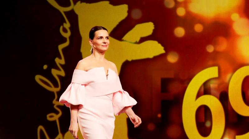 Actress and jury president Juliette Binoche walks onstage at the award ceremony of the 2019 Berlinale Film Festival in Berlin. (Photo: AP)