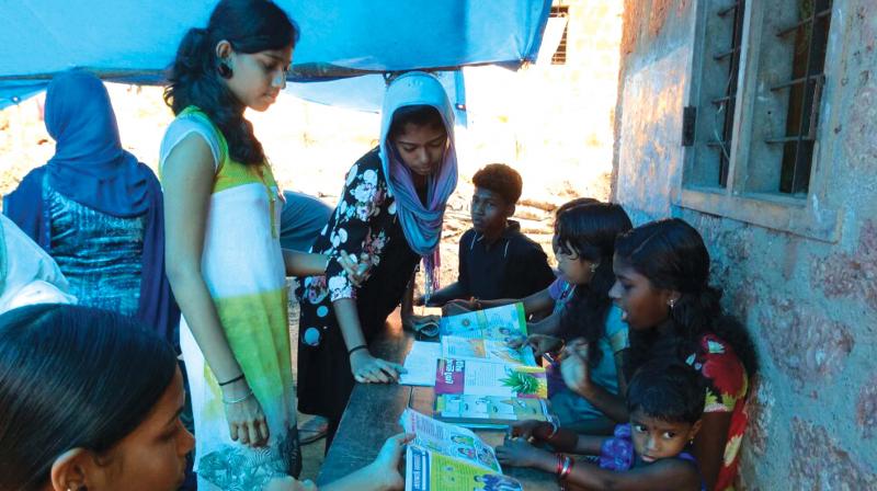 NSS volunteers of Edakkara GHSS conduct literacy camp for tribal children.