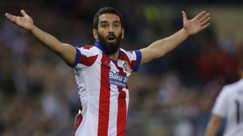 \I really love my country. I really love my flag. I have always said: \If thats what you want, I will retire,\ said FC Barcelona Arda Turan. (Photo:AP)