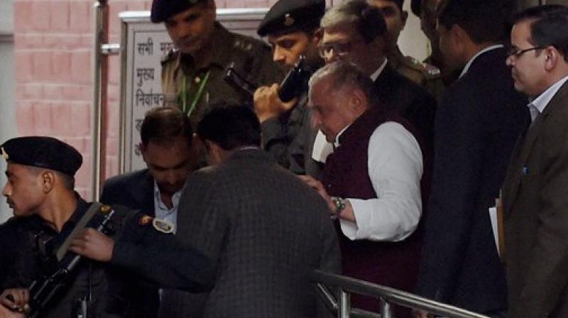 Samajwadi Party President MulayaM Singh Yadav comes out of the Election Commission office in New Delhi. (Photo: AP)