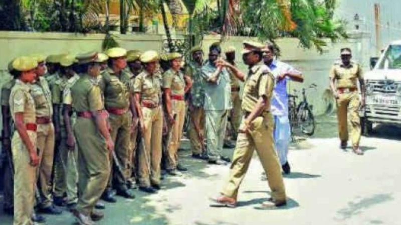 Complaint was lodged with the Uppal police by one Raghupathi Reddy on Sunday who alleged that a staffer from the GHMCs Uppal circle was found taking photographs of his under-construction building on Saturday.