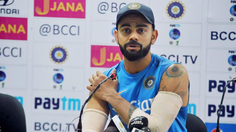 Virat Kohli sustained the right shoulder injury while putting in a dive on the first day of the drawn third Test in Ranchi. (Photo: PTI)