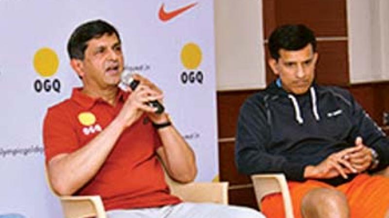 Prakash Padukone (left) and Vimal Kumar during an OGQ event in Bengaluru on Friday (Photo: DC)