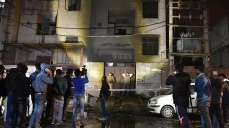 10 women and seven men were killed while a man and woman were injured in a massive blaze at a firecracker storage unit in outer Delhis Bawana industrial area yesterday evening. (Photo: PTI)