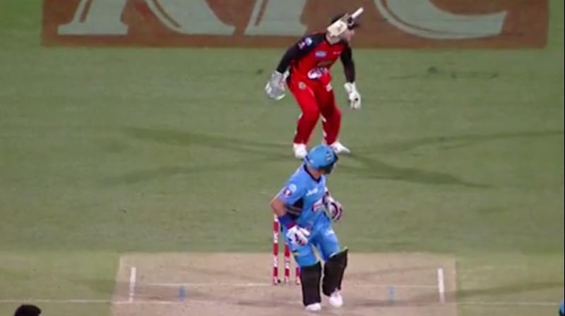 Watching the ball, Nevill was unaware of the bat flying towards him and the handle caught him flush in the face, leaving him in a heap on the turf. (Photo: Screengrab)