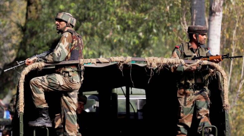 Soldiers guard outside the Army base which was attacked suspected militants in Uri, Jammu and Kashmir. (Photo: PTI/File)