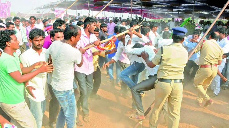 TRS and Congress party workers clash at the Sweet Lime Market Yard in Nalgonda on Tuesday  DC