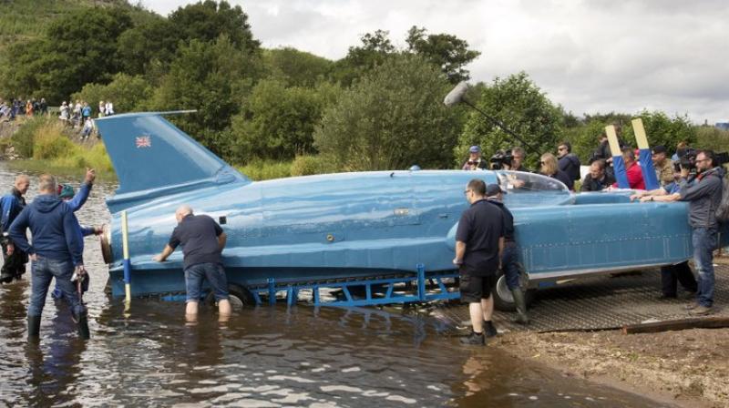 The jet-powered Bluebird roared past 300 mph (482 kph) before it vaulted into the air, flipped and crashed into the lake, breaking in two and killing the 45-year-old Campbell. (Photo: AP)