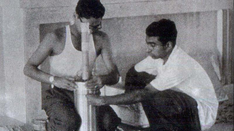 A picture from the book shows R. Aravamudan (left) and A.P.J. Abdul Kalam prepare a payload inside a church building in Thumba, Kerala in 1964.