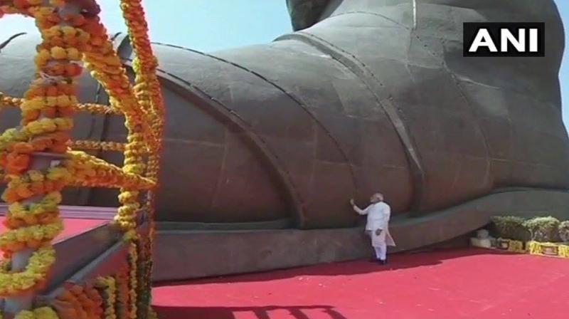 Divya Spandana tweeted photo of Prime Minister Narendra Modi standing next to the foot of Statue of Unity and captioned it as Is it a bird dropping? (Photo: Twitter | ANI)